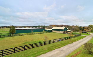 Barn and Arena Exterior View - Country homes for sale and luxury real estate including horse farms and property in the Caledon and King City areas near Toronto
